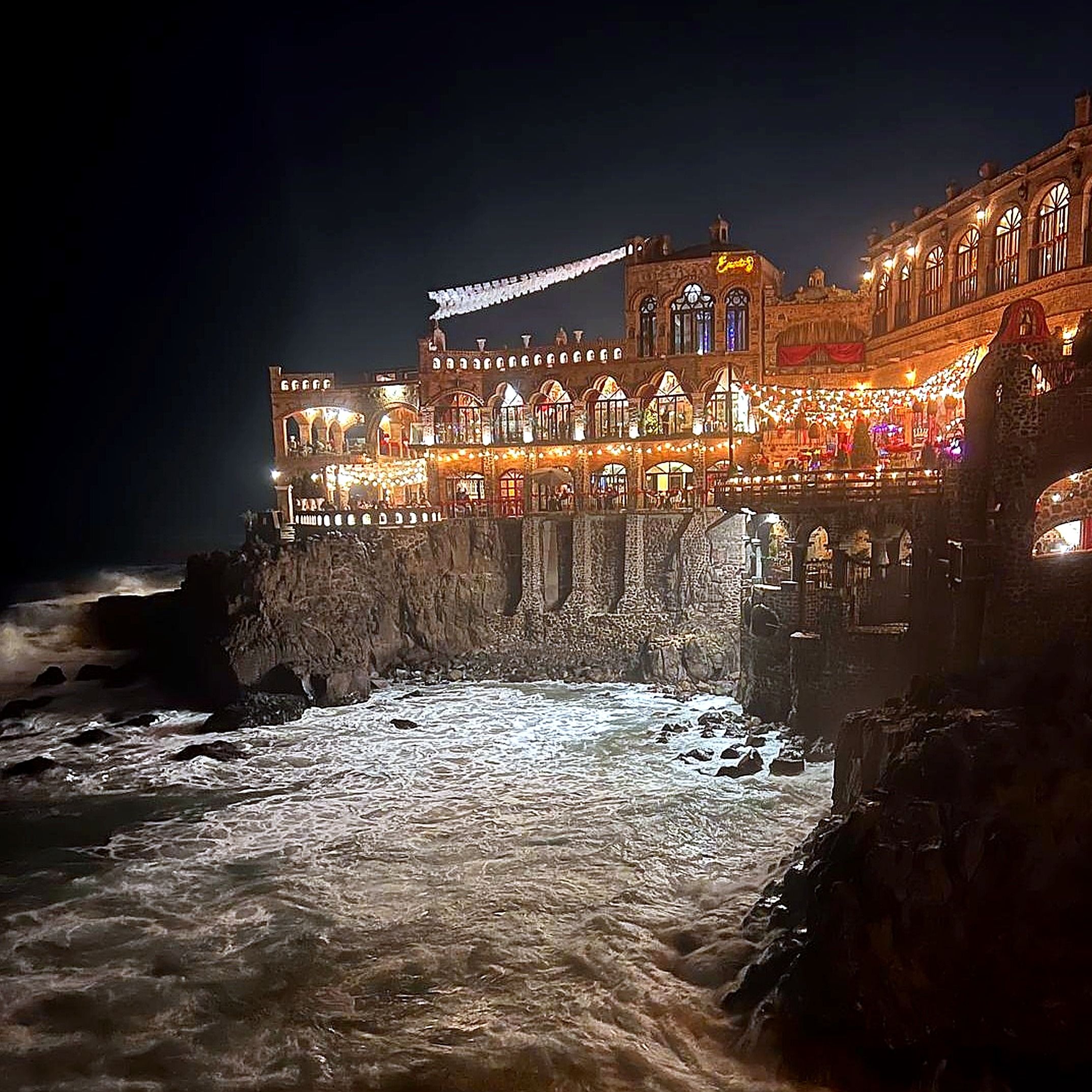 Oceanfront dining at night