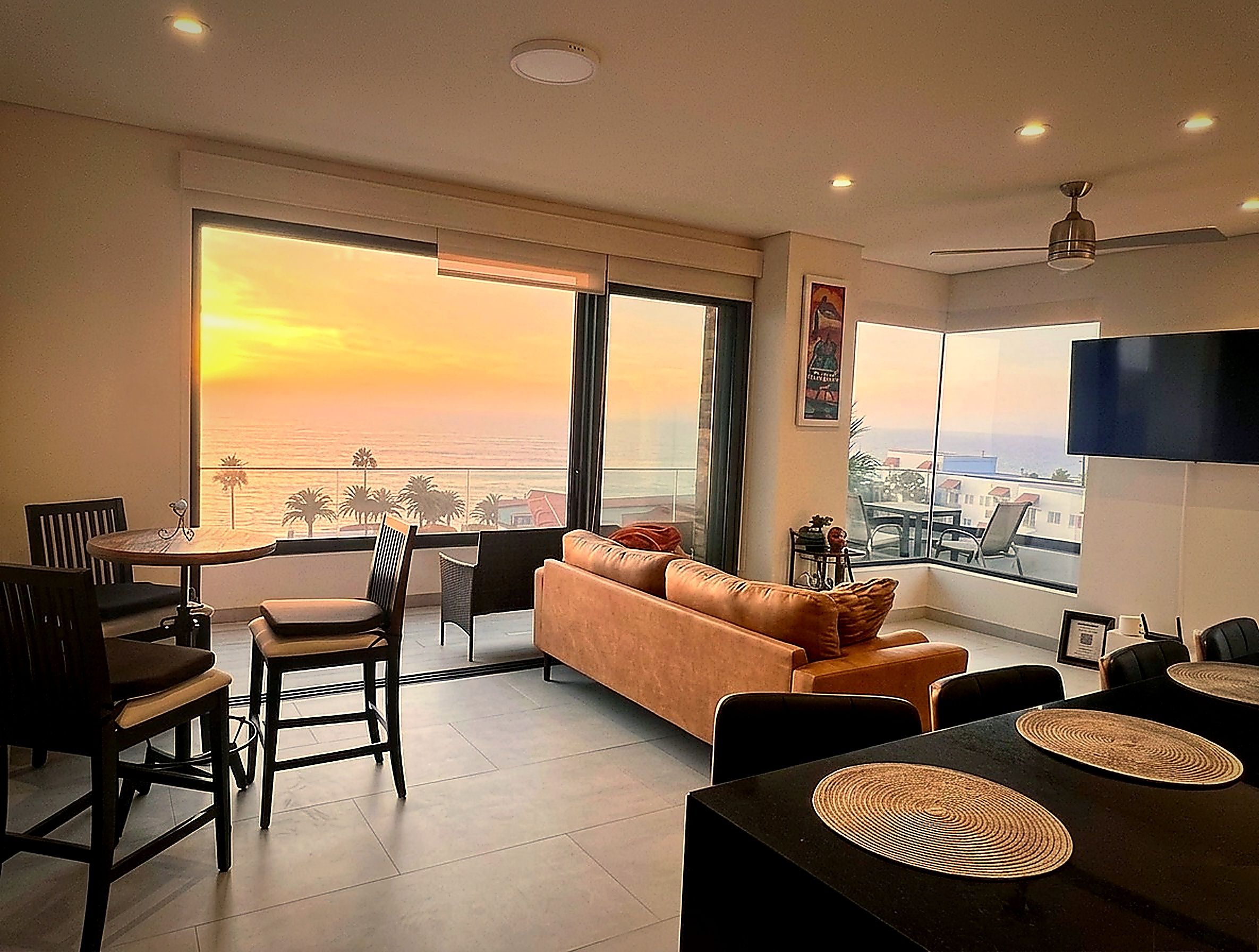 Oceanfront living room at sunset