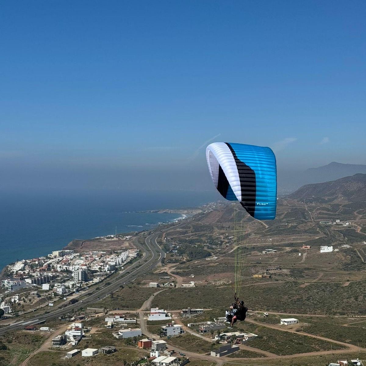 Paragliding along the coast